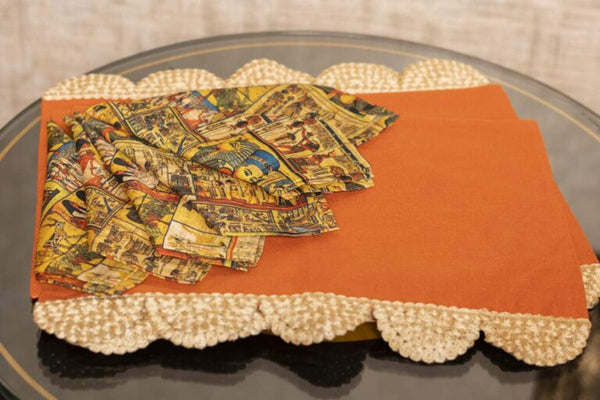 Orange Mats with Mesopotaniam Napkins