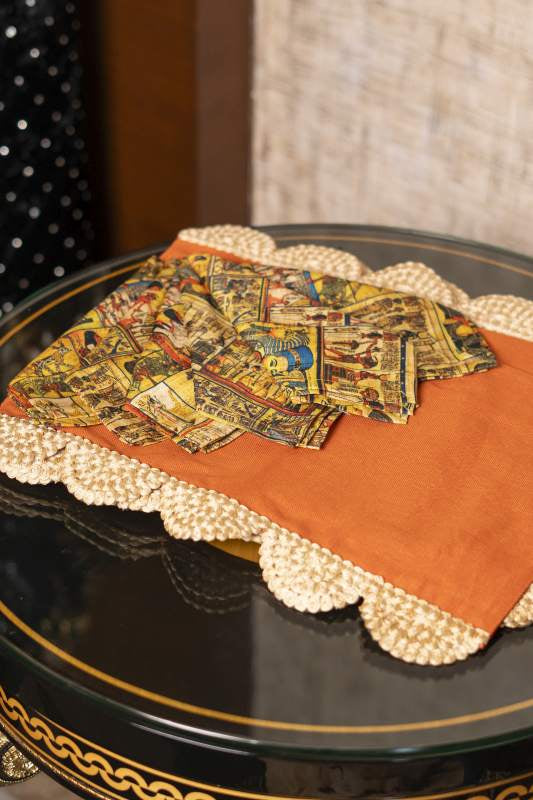 Orange Mats with Mesopotaniam Napkins